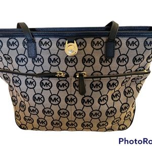 Michael Kors: Black and Tan Shoulder Bag